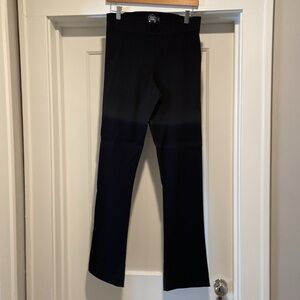 Black slacks size 8 in stretchy fabric. Worn only few times. Perfect condition.
